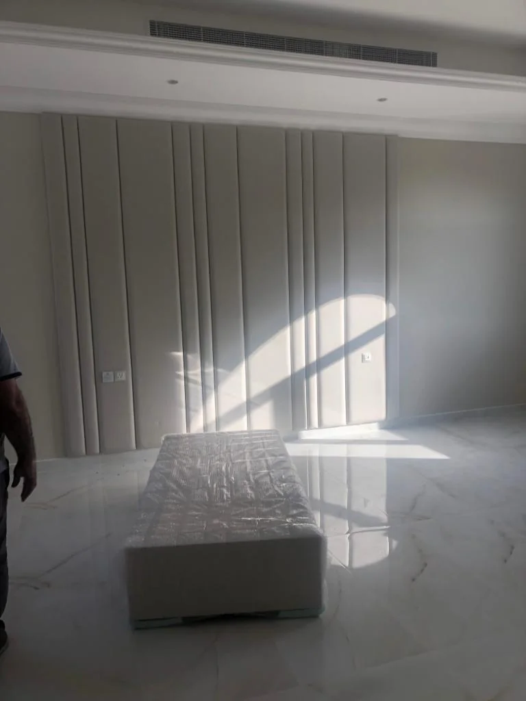 Vertical wall panels and a reflective veined floor